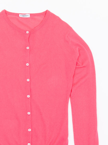 Flat lay of women's flamingo pink long sleeve cardigan knit in a luxury and premium sea island cotton.